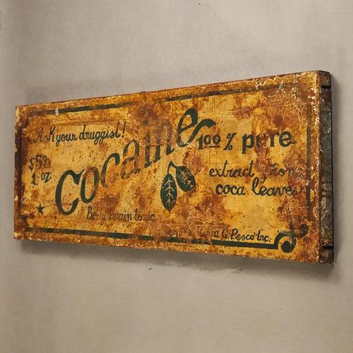 A work of art that recalls the style of old advertising signs, created with a special technique that uses rust as a...