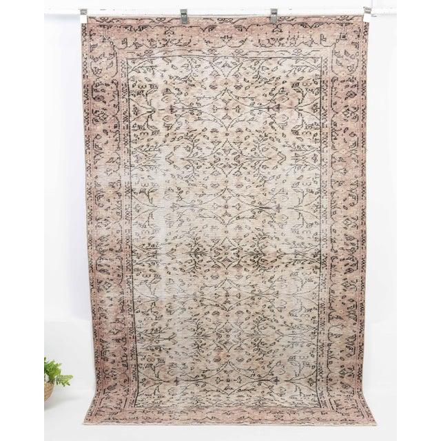 Vintage Turkish Hand-Knotted vintage rug is a semi-antique vintage Area rug.'70s Eastern region of Turkey's unique rug is...