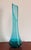 This tall swung vase is a strong example of mid-century American art glass at its most fluid, with a graceful pulled and...
