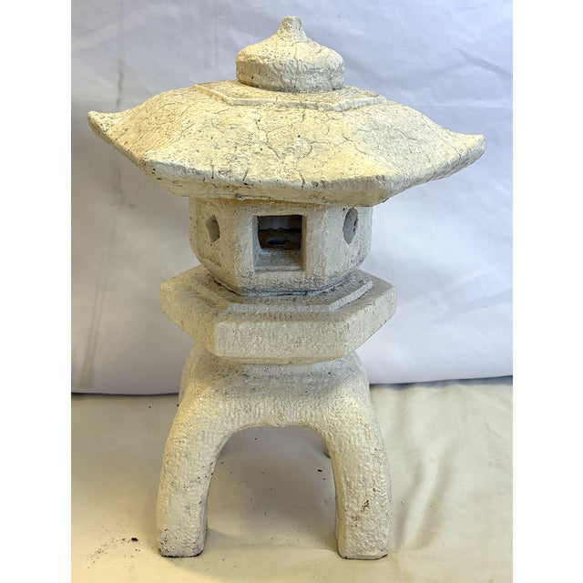 Great little vintage garden statue from the late 20th century. The cast stone piece depicts an Asian style garden pagoda....