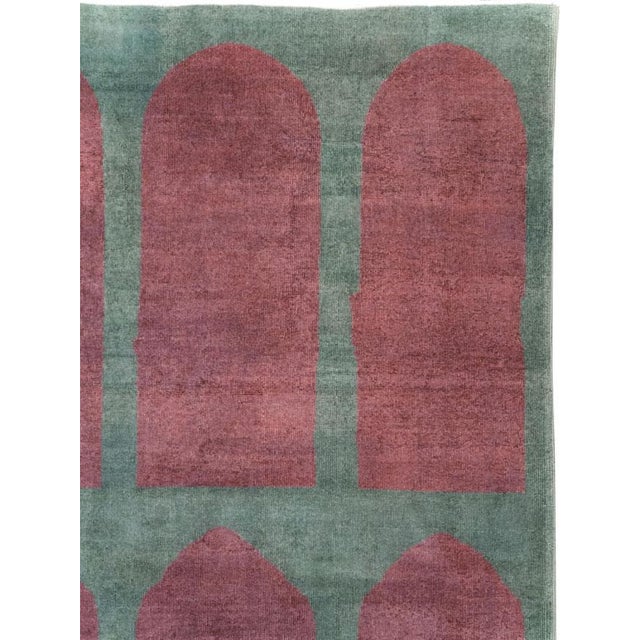 This Mid-20th century Turkish Art Deco Style room-size carpet presents a bold, orderly composition of fifteen elongated...