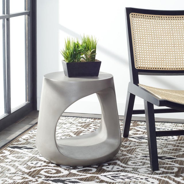 A designer must-have for today’s modern Zen gardens and chic outdoor entertaining spaces, this Vikki Accent Stool is...