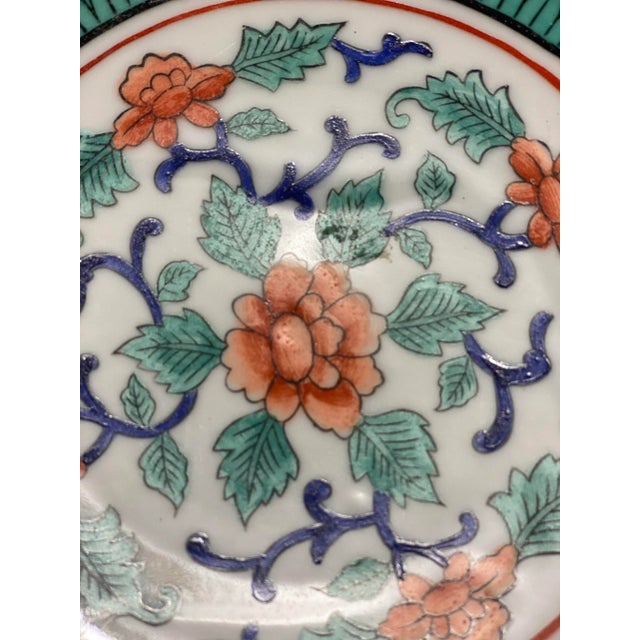 This beautiful, hand painted bowl is covered on the inside with a truly unique pattern of fish, flowers, fauna, and what I...