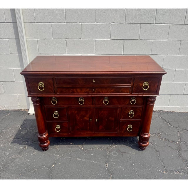 A gorgeous American Empire or Victorian style master dresser or chest of drawers by Henredon, USA, Late 20th Century....