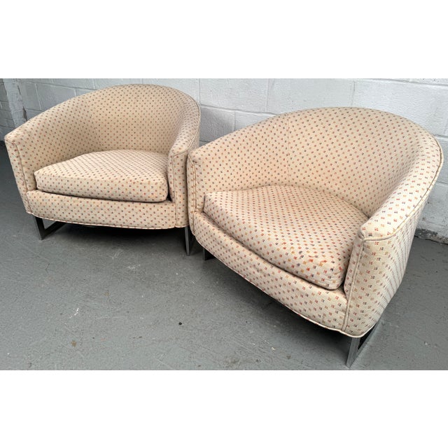 Exceptional pair of mid-century modern barrel lounge chairs designed by Finn Andersen for Selig, featuring sleek chrome...