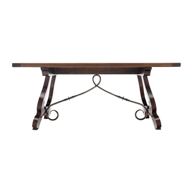 Antique table from France made of solid wood and finished with a lustrous French polish of museum quality. The base has...
