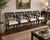 Elegant and timeless, this set of four armchairs by Century Furniture (Hickory, NC) embodies the refined geometry and...
