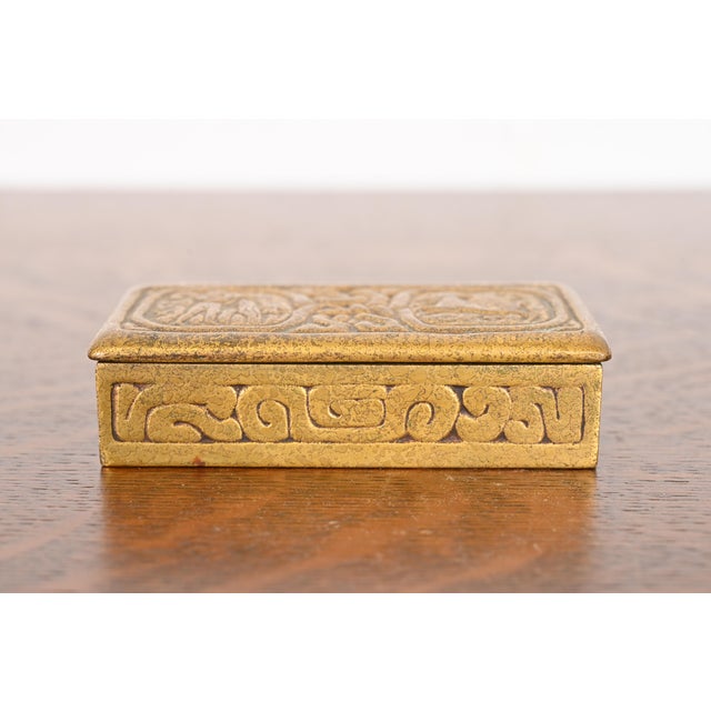 A gorgeous antique Arts & Crafts or Art Deco period gilt bronze "Zodiac" pattern stamp box, desk box, decorative box, or...