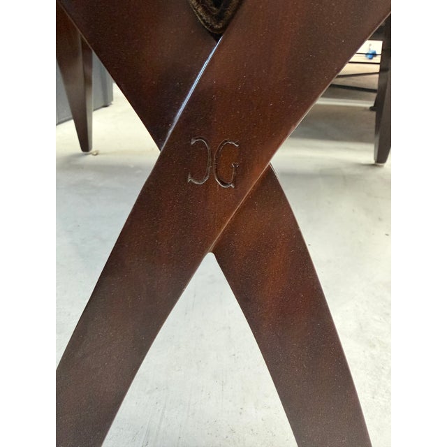 Three (two are identical) Christopher Guy FABULEAUX chairs. Excellent condition. Both materials are warm tones with brown...