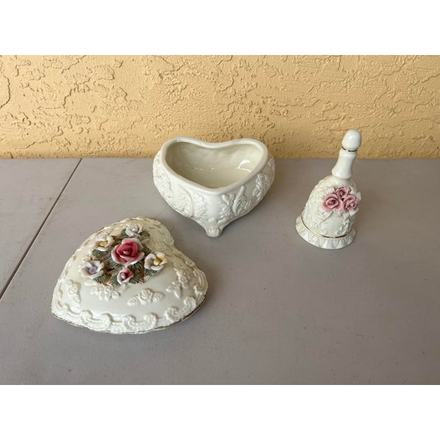Victorian-style heart trinket box & Bell . This is a delightful and unique addition to any collection. The footed heart...