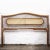A decorative vintage bamboo and rattan double headboard. This piece is attributed to the mentioned designer/maker. It has...