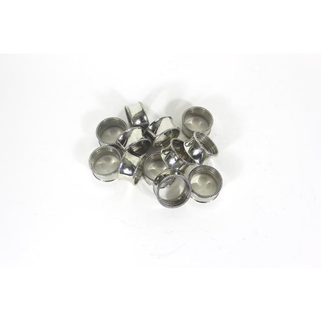 English 1960s Silver Plated Beaded Edge Napkin Holder Rings Polished - Set of 12 For Sale - Image 3 of 10