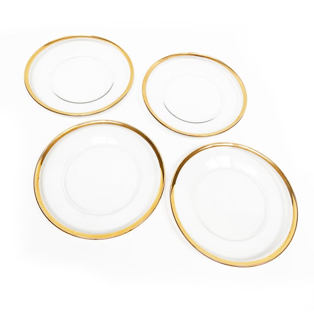 Enhance your dining experience with this set of 4 large, oversized mid-century dinner plates. Crafted from clear glass and...