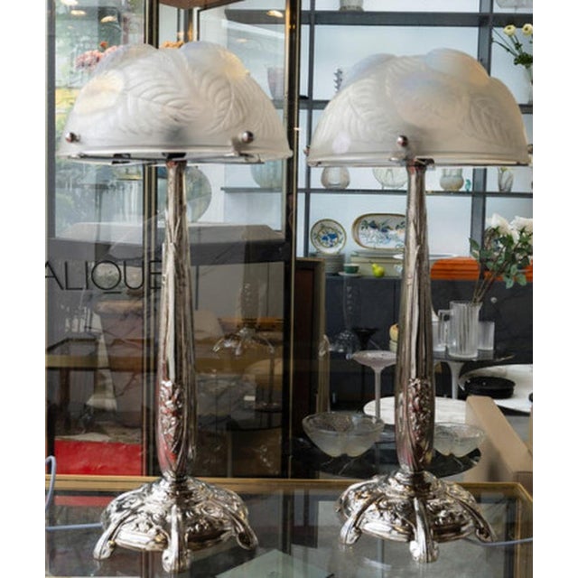 Pair of "Dahlias" lamps in opalescent glass Model created by René Lalique in 1921 and discontinued in 1937 The pendant...