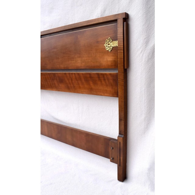 An elegant full size midcentury modern walnut headboard embellished with pierced solid brass Chinoiserie accents; ready...