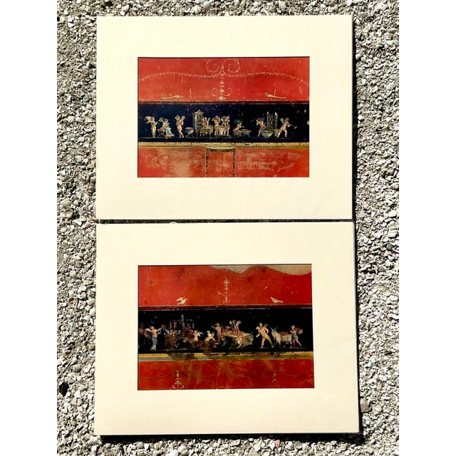This striking pair of vintage prints offers a sophisticated homage to the world-renowned frescoes of ancient Pompeii. Each...