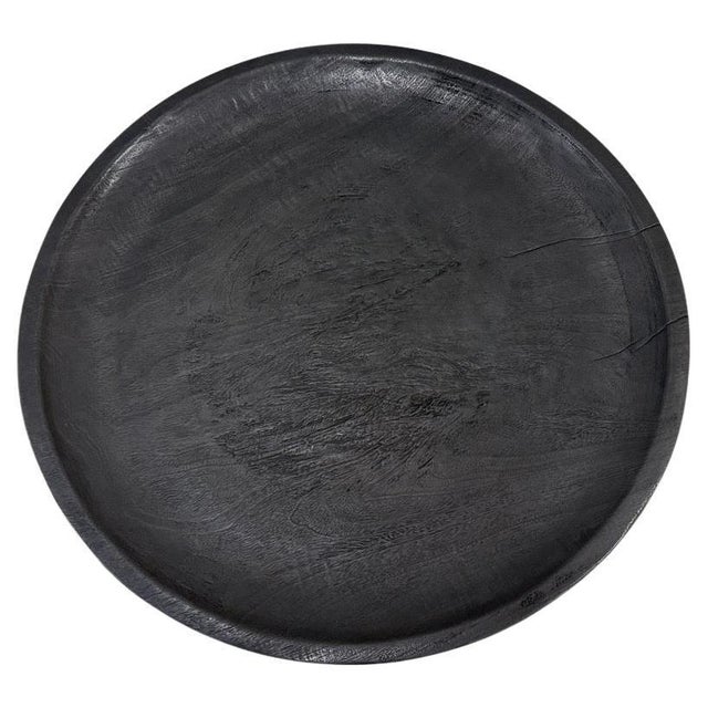 Beautiful oversized wood platter or bowl hand carved from a single piece of suar wood. The backs are flat and can...