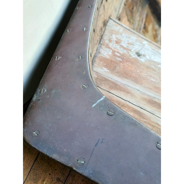 A unique and exceptionally decorative fragment of an authentic wooden boat, preserved in the form of a large half-hull...