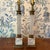 Neoclassical mid-century lamps with classic diamond pattern crystal, and veined marble base. Brass hardware with aged...