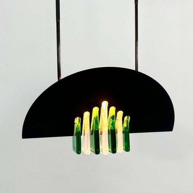 Green and White Murano Pendant Light from Mazzega, 1970s, in Good conditions. Designed 1970 to 1979 This piece has an...