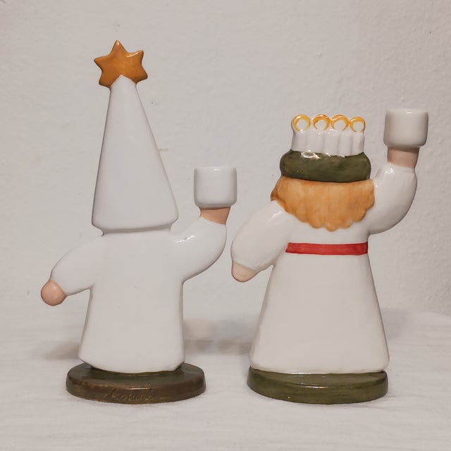 Presenting a complete four-piece holiday ceramic candle holder set designed by iconic Swedish modernist Lisa Larson during...