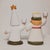 Presenting a complete four-piece holiday ceramic candle holder set designed by iconic Swedish modernist Lisa Larson during...
