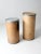 This is a pair of vintage farm bins crafted from sturdy paperboard with metal rims and hinged locking caps. Originally...