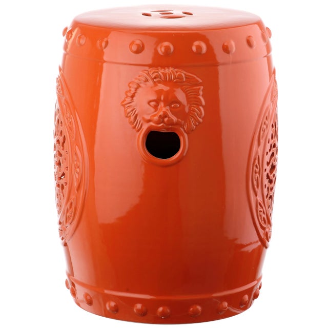 Global influences abound in the orange glazed ceramic Flower Drum indoor-outdoor garden stool. Classic Chinese vessel...