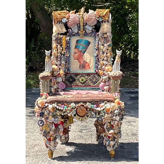 Transform your space with this extraordinary Vintage Boho Artisan Found Object and Shell Chair, a true masterpiece of...