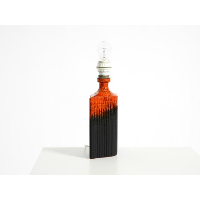 Beautiful glossy ceramic table lamp from the 1960s by kaiser leuchten. features a label on the base. Made in germany....
