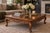This is a beautifully crafted, oversized coffee table stained in a medium shade of brown. This item was in our...