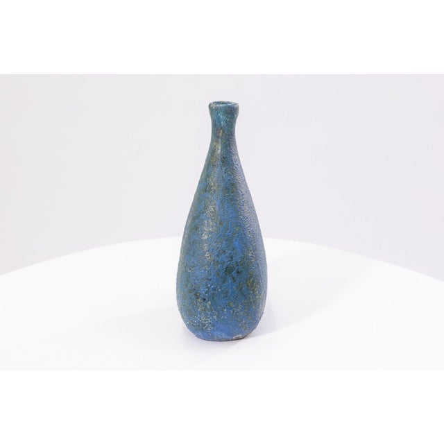 A mid-century ceramic vase by celebrated Italian designer Marcello Fantoni, showcasing his signature fusion of sculptural...