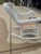 Heywood Wakefield white wicker rocker. No damage to the chair, just needs a paint touch up. In great shape