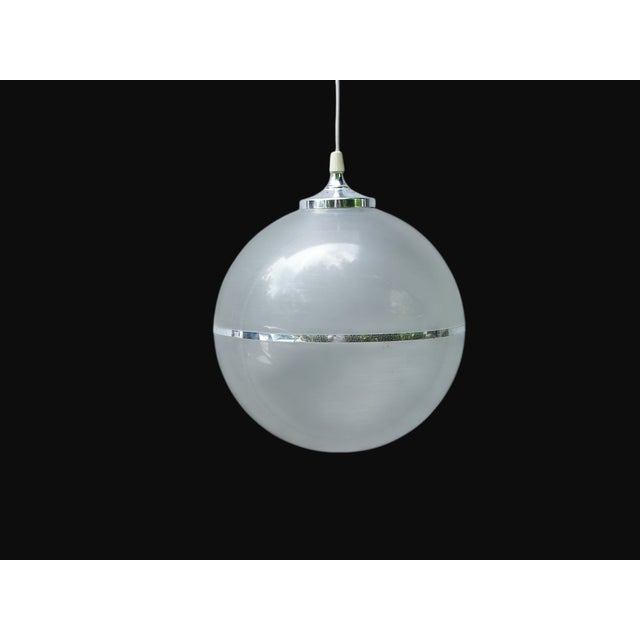 Vintage Italian Space Age Pendant Light in Acrylic Glass, Chrome and Steel, 1970s, in Very Good conditions. Designed 1970...