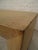 Table with beige color cloth and brass trim base. Table has been lacquered to prevent further fraying. (Please confirm...