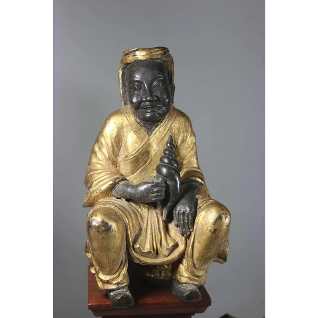 Stunning 19th century American Victorian mahogany table upon which the lower shelf sits a very rare and special Japanese...