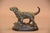 The standing dog, alert and poised on a naturalistic base, was a favorite subject for decorative bronze sculptors well...