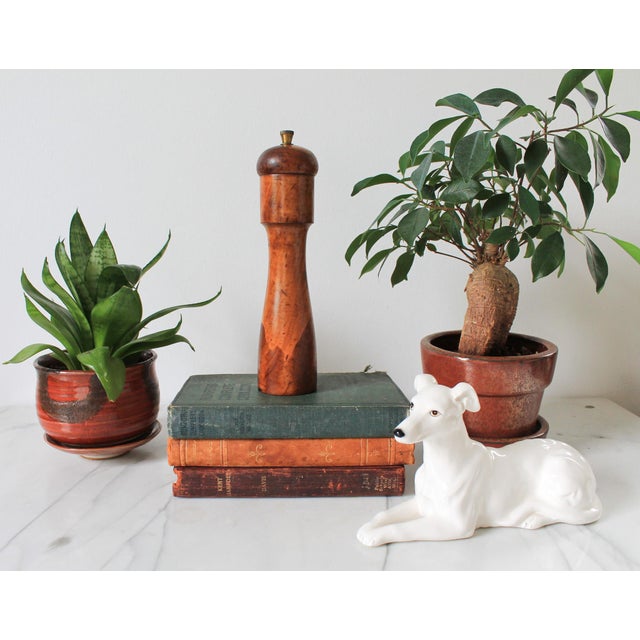 Vintage olive wood pepper grinder. Made in Spain. Makers mark on bottom. Minor age wear.