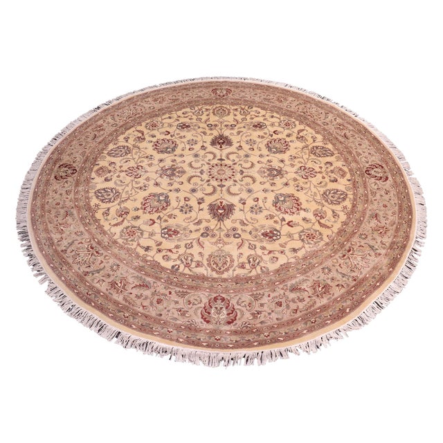 This hand‑knotted Pak Persian round rug showcases the finest expression of traditional Persian artistry. Each piece is...
