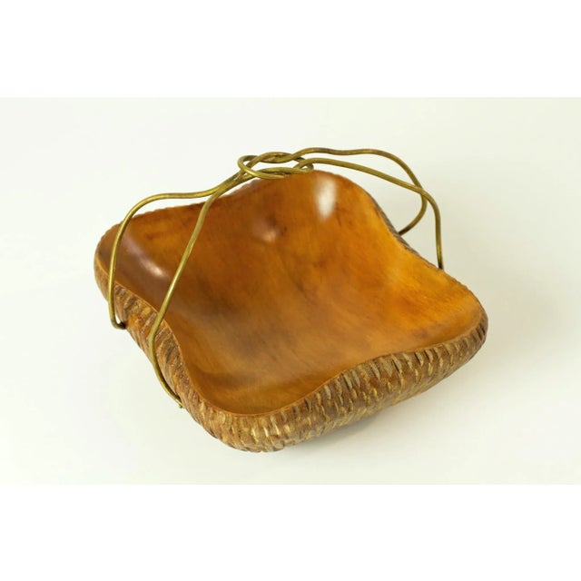 An artisanal basket handmade in the 1950's from maple wood and brass.