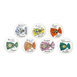 Mid Fornasetti "Al Merito" Porcelain Coasters, 7 For Sale
