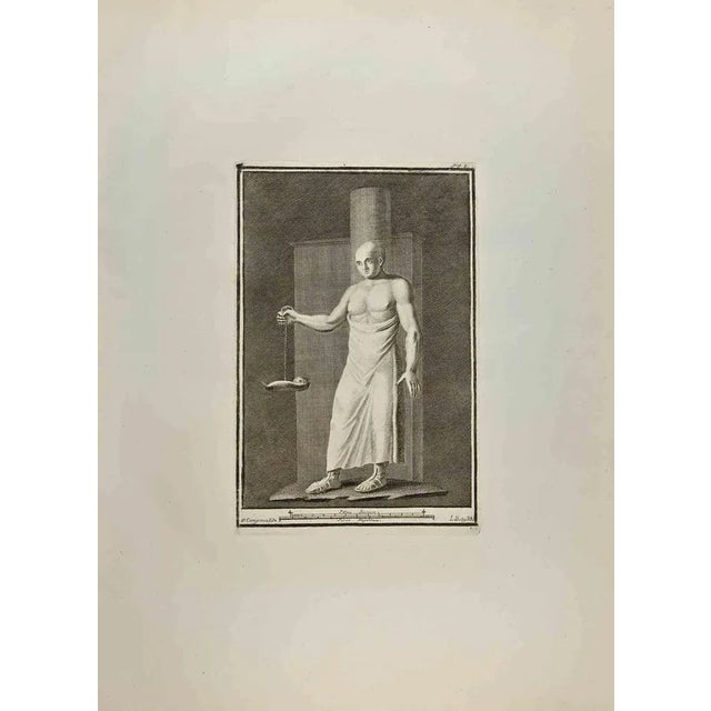 Man with Lamp from "Antiquities of Herculaneum" is an etching on paper realized by Ludovico Boily in the 18th Century....