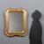 Late 19th-century French cabaret mirror featuring a gilded molded frame enriched with elegant punchwork. The leafy motifs...