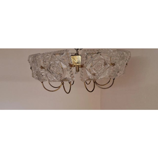 Vintage Chandelier with Brass Frame and Interconnected Crystal Glass Plates, 1970s, in Very Good conditions. Designed 1970...