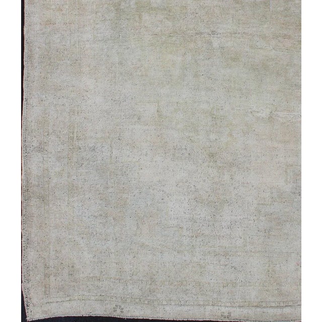 Mid 20th Century Vintage Turkish Oushak Rug With Understated Design and Muted Tones For Sale - Image 4 of 10