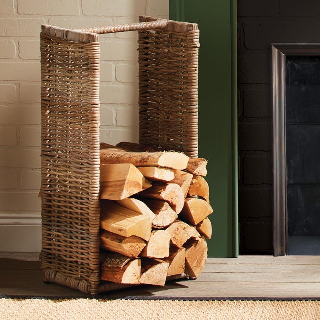 The tall, structured shape of this basket is ideal for the stack of painstakingly chopped wood logs. Place next to the...