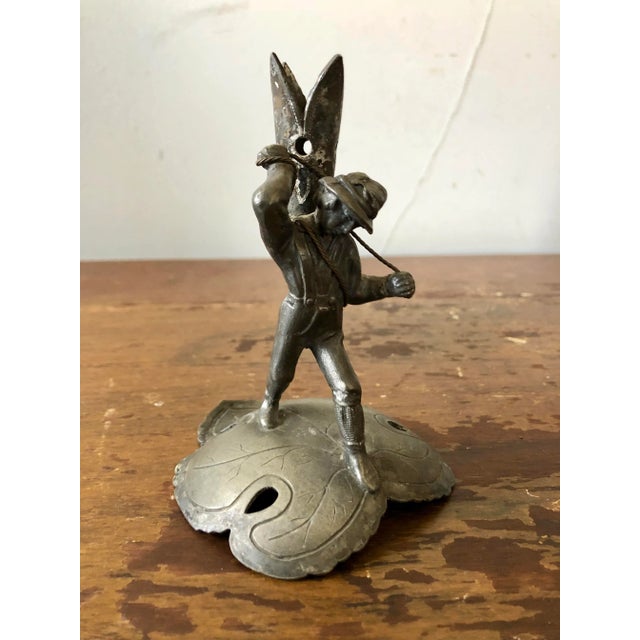 Antique Wilcox silver plate figural candleholders.