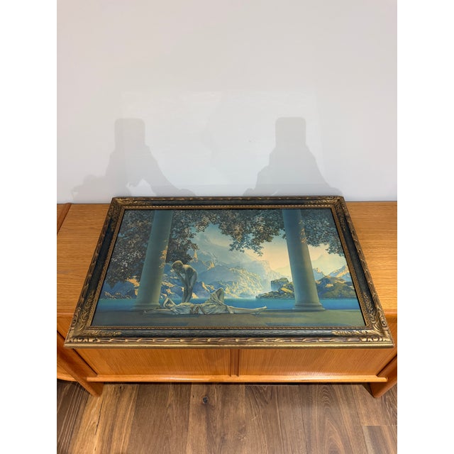 An exceptional period example of Maxfield Parrish’s iconic Daybreak, presented in its original ornate frame and preserved...