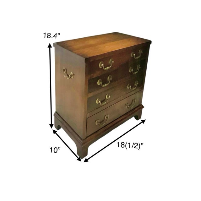 The Vintage Salesman Sample Chest is a rare and unique piece of small solid wood furniture. With its old vintage design...