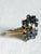 A striking vintage 14K yellow gold cluster ring featuring a dramatic cascade of blue sapphires and diamonds arranged in an...
